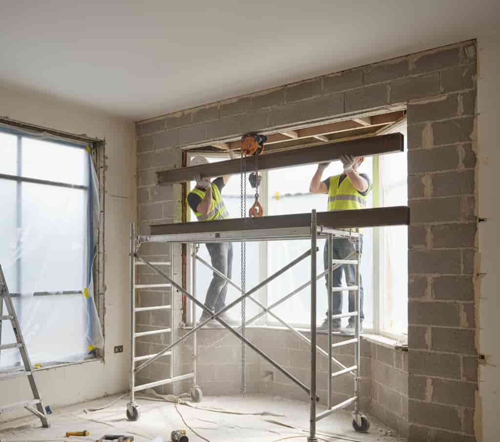 Ouverture dans un mur porteur avec pose de renfort IPN pour créer une baie vitrée, travaux nécessitant une déclaration préalable d’urbanisme